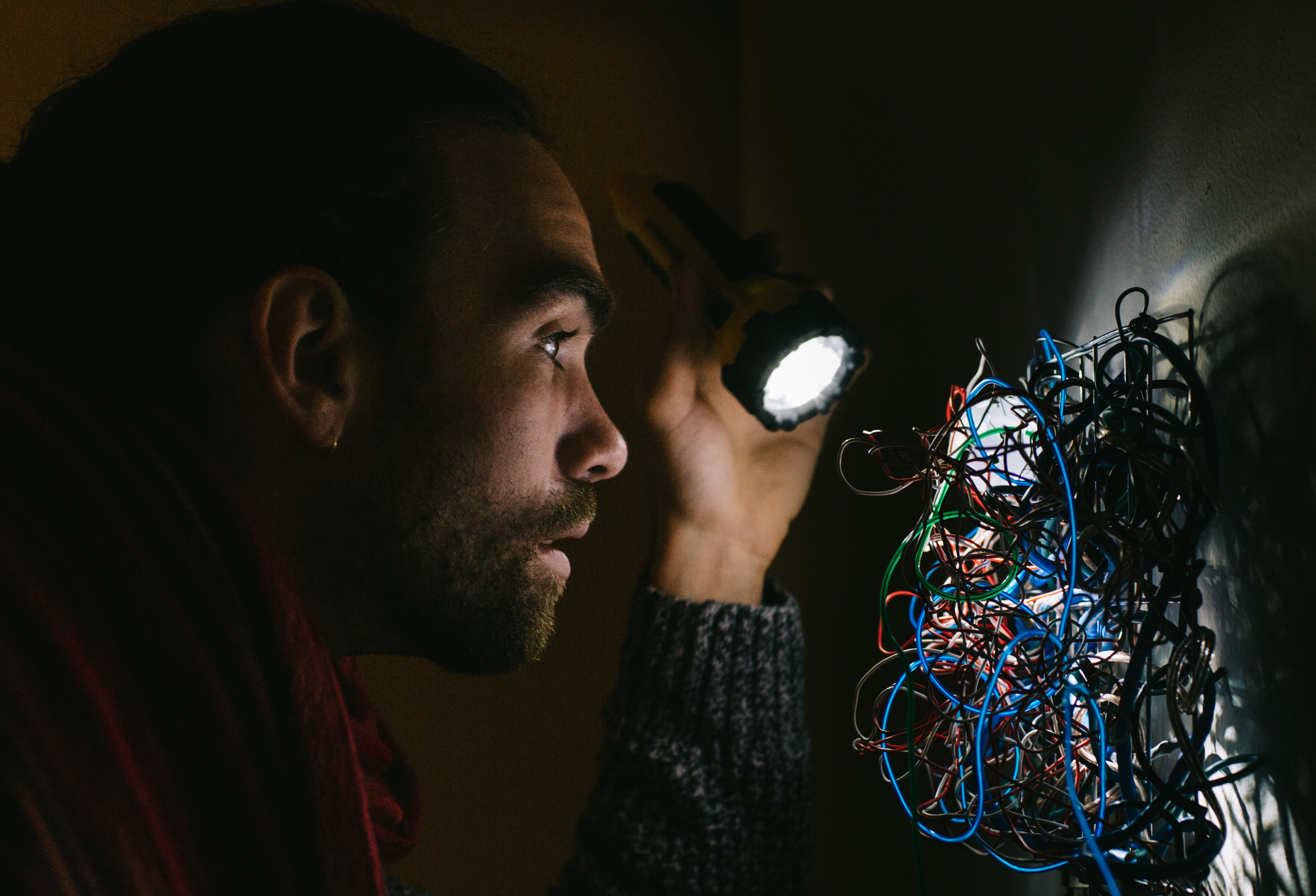 A UW student triggers one section of the tangled wire display