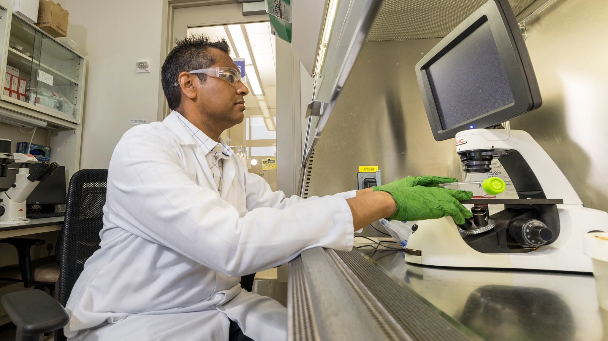 Dr. Kris Saha works with CRISPR technology in his laboratory (Photo from the Department of Biomedical Engineering at UW–Madison)