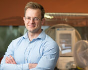 Dr. Andrew Hryckowian in his lab.