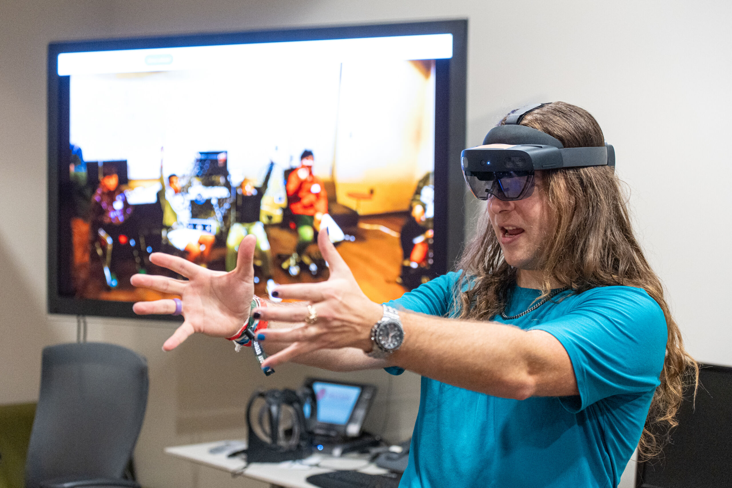 Bryce Sprecher demonstrating VR technology