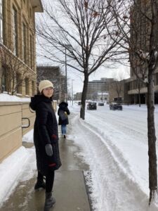Nan walking on campus on a very snowy day