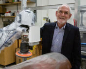 Robert Radwin, professor emeritus of industrial and systems engineering, has recently worked with major companies to study the benefits and issues associated with introducing collaborative robots to manufacturing systems. Photo: Joel Hallberg / UW–Madison College of Engineering
