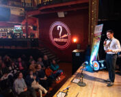 Ben Rush hosting the WhySci Variety show 2025