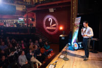 Ben Rush hosting the WhySci Variety show 2025