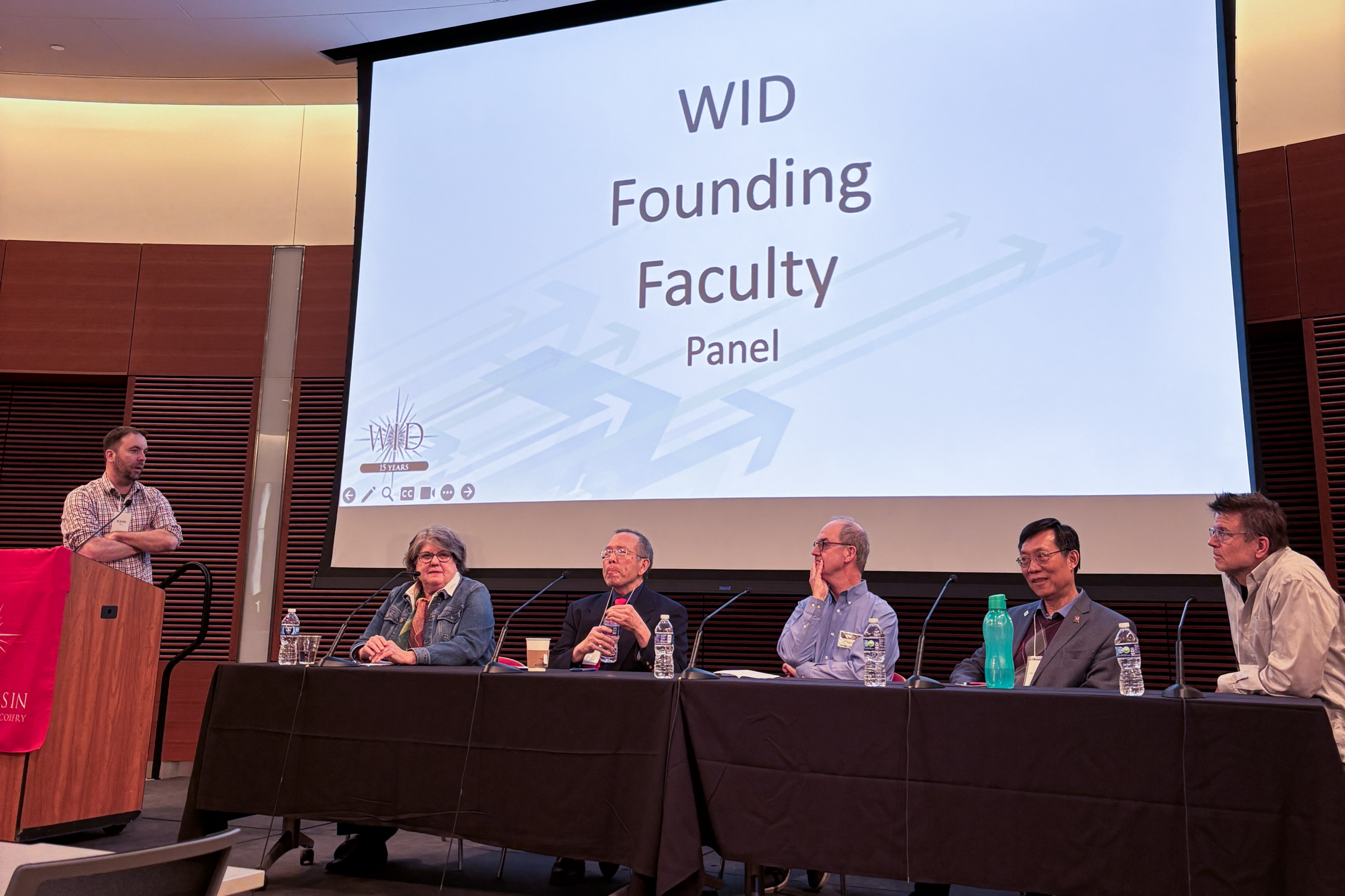 The original 5 WID PI's talking in a panel at the 2025 symposium
