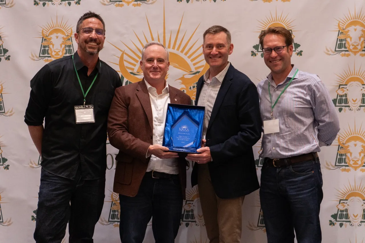 Accepting the 2025 Dual-Use Solar Plan of the Year Award at the North American Agrivoltaics Awards, Chicago, IL, August 12, 2025. Pictured (L–R): Dan French (Solar Farm Summit), Josh Arnold (UW–Madison), Josh Sherry (Alliant Energy), Jordan Macknick (InSPIRE network). Photo by Katie Meyer