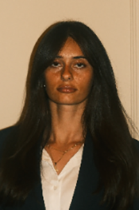 MillaLaskosky Milla Laskosky portrait. Woman with long dark hair.